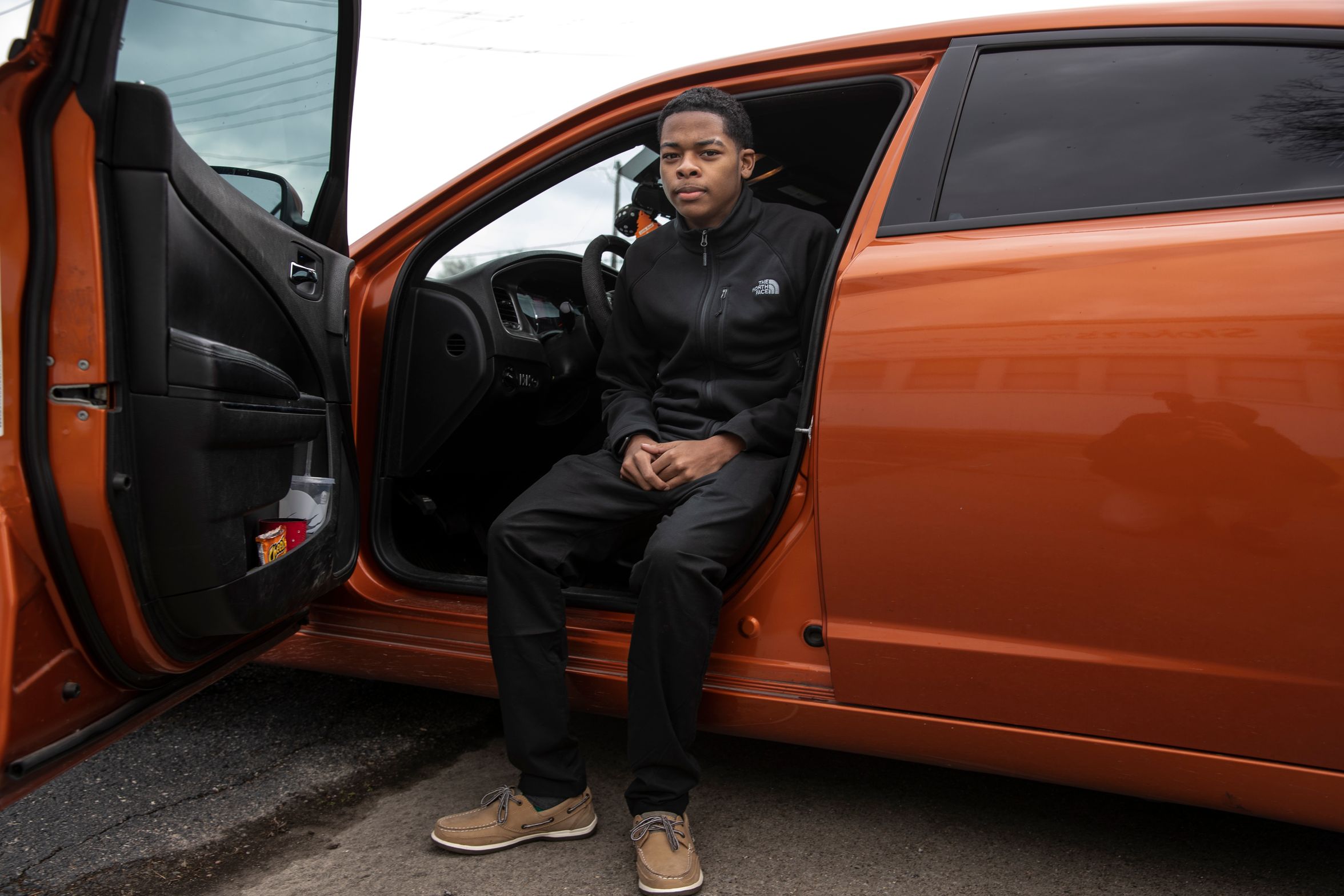 Tae-Ahn Lea, 18 was stopped by police, frisked and handcuffed at 18th and Burwell Ave. He is seen with the car he was driving. March 21, 2019.