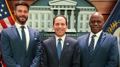 Louisville Metro Government photo shows, from left: State Sen. David Yates, who was named Jefferson County clerk, Mayor Craig Greenberg and Deputy Mayor David James, who was named sheriff.